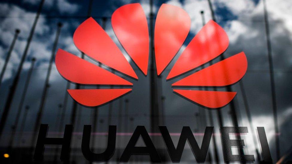 Huawei logo and clouds