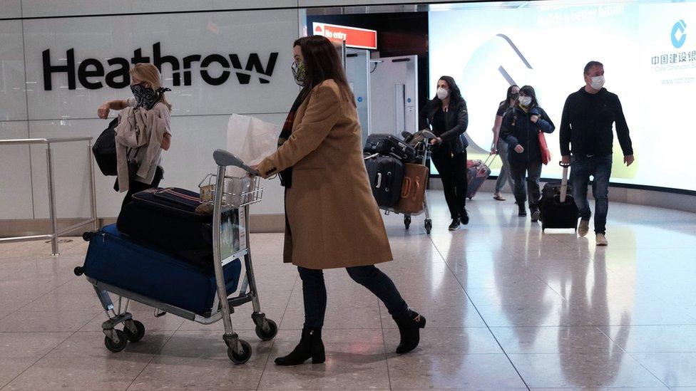 People arriving at Heathrow airport