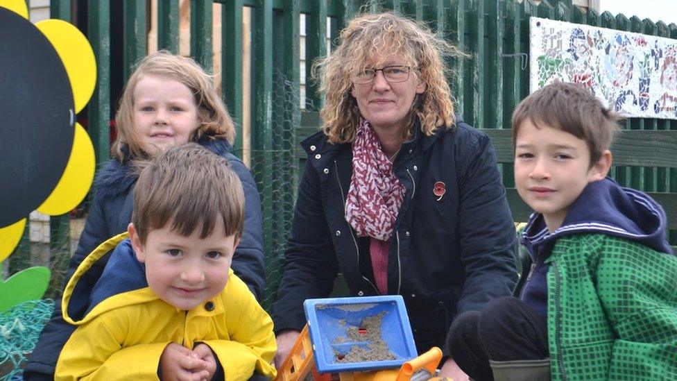 Head teacher Ruth Stout with pupils Freyja, Luca and Ander