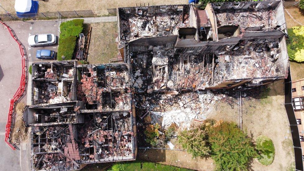 Redwood Grove destroyed building