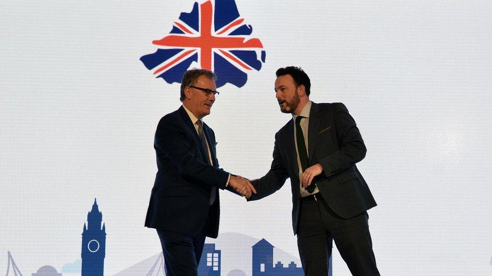 UUP leader Mike Nesbitt welcomes SDLP leader Colum Eastwood to the conference