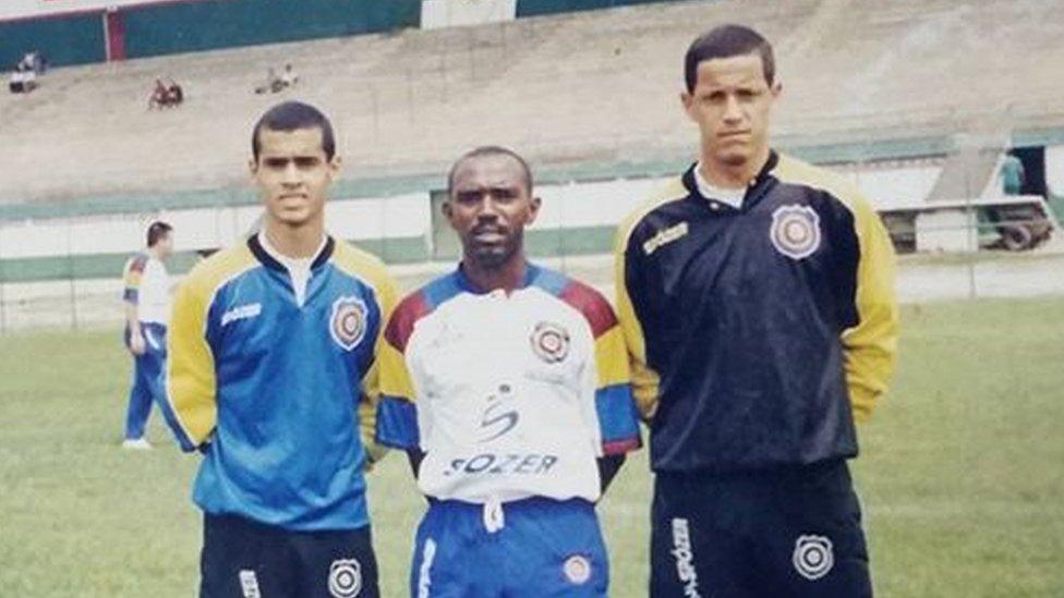 Douglas Braga (left) with the coach of Madureira and a teammate