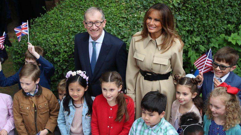 Melania Trump and Philip May with children at a garden party at 10 Downing Street