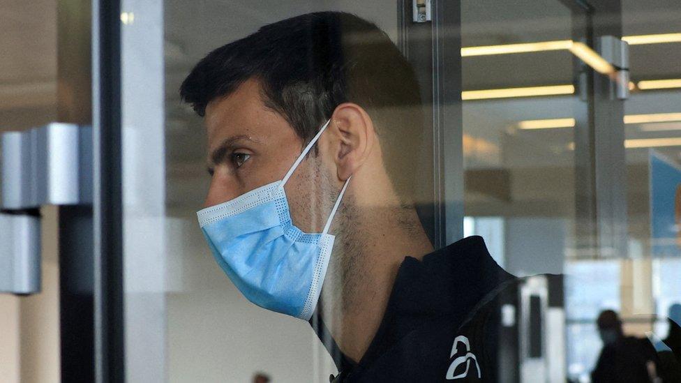 Novak Djokovic wearing a face mask in close-up