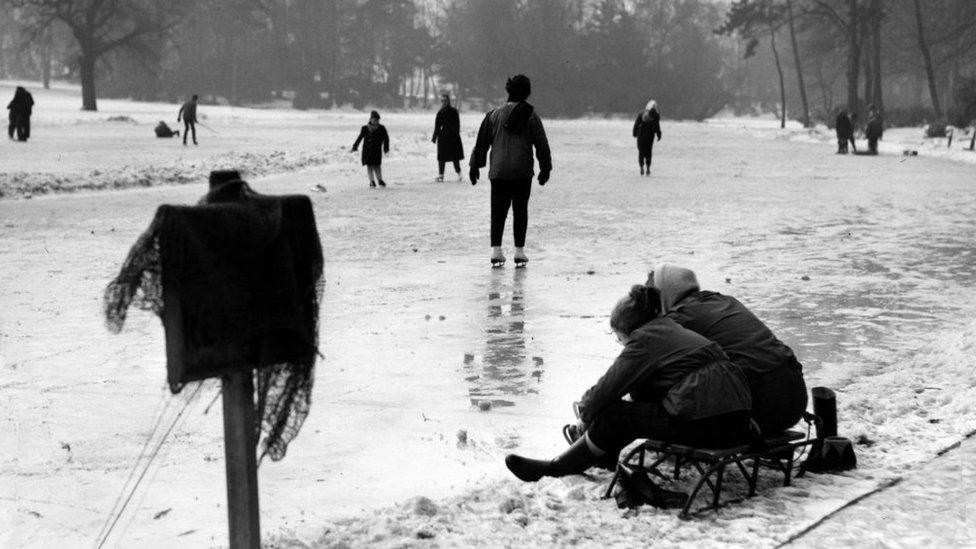 Skaters are pictured on the frozen lake in January 1963.