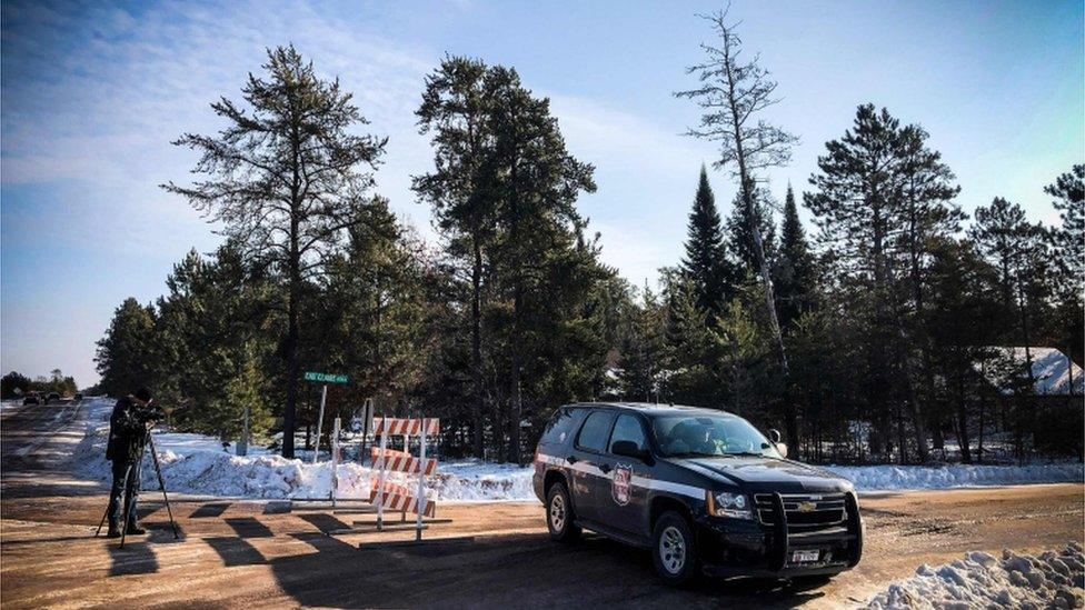 A police car blocks the road where teenager Jayme Closs was found on January 11, 2019 in Gordon, Wisconsin