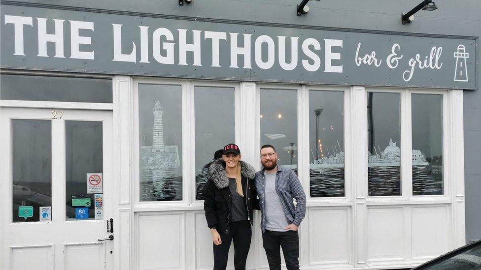 Jamie Grant outside his restaurant with Leah McCourt