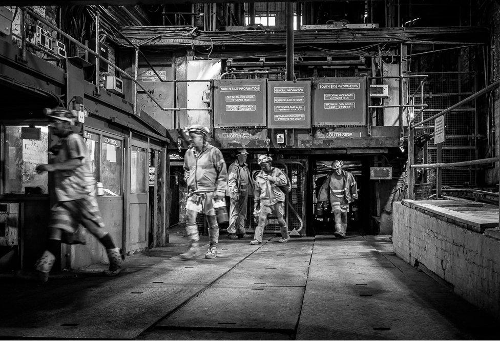 Miners off to work inside Thoresby Colliery