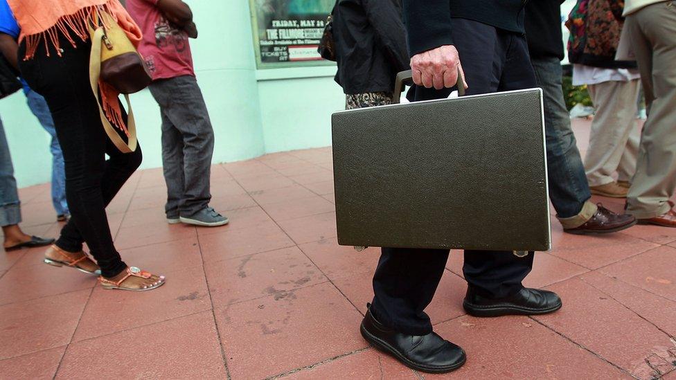 Man carrying briefcase