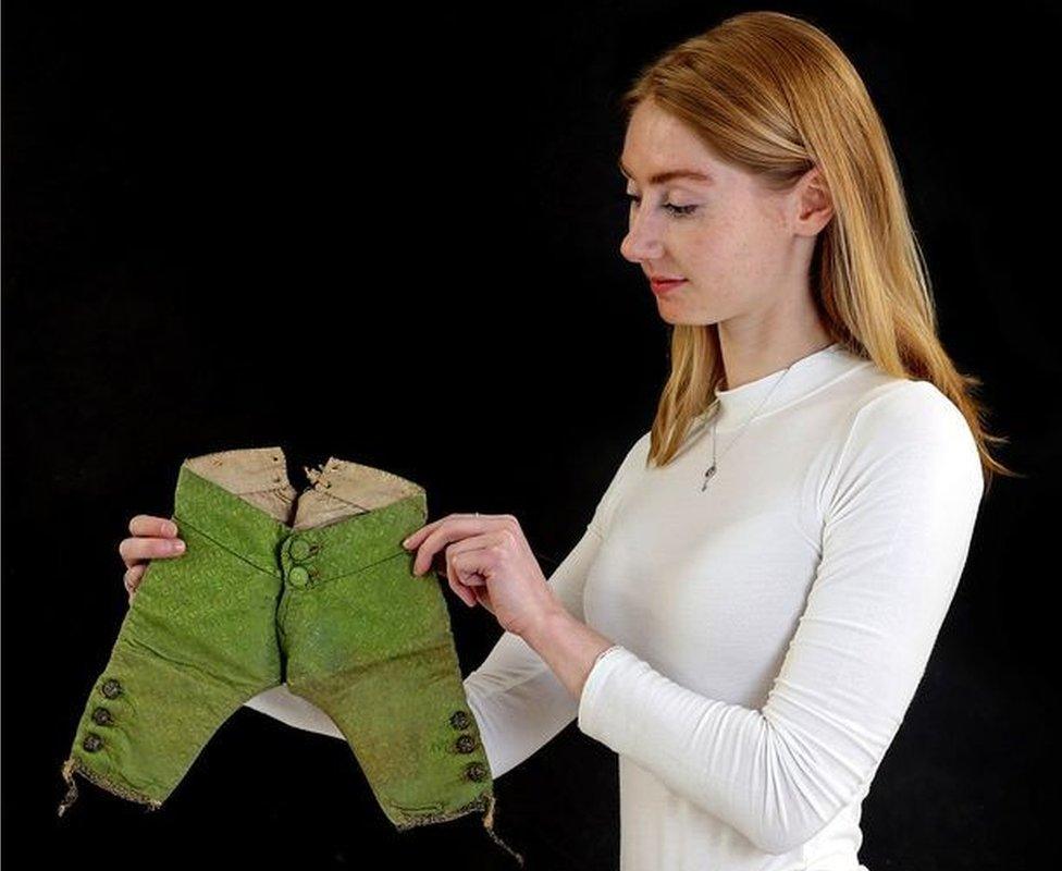 A pair of green silk brocaded trousers thought to have been worn by the 17th century court dwarf Sir Jeffrey Hudson sold for £9,570 at auction