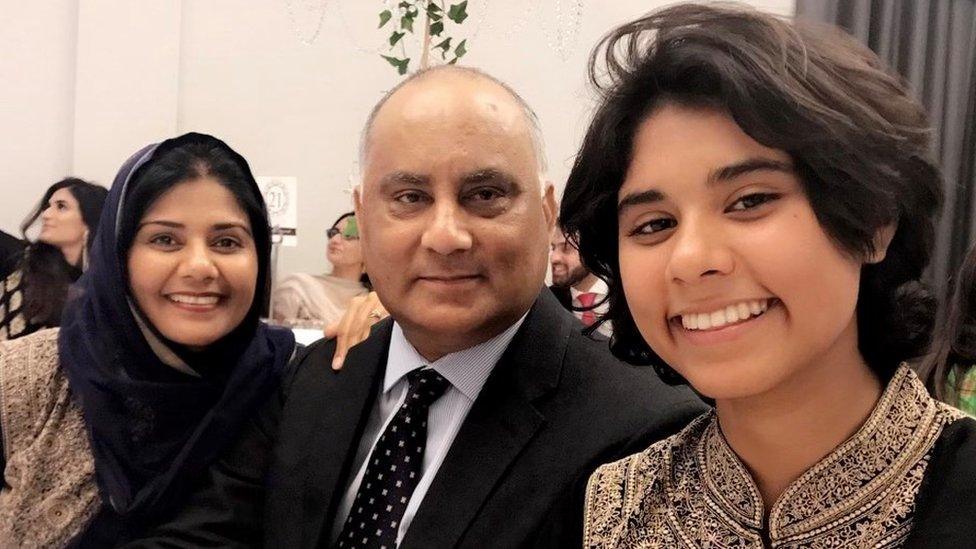 Amjid Ali with wife and daughter