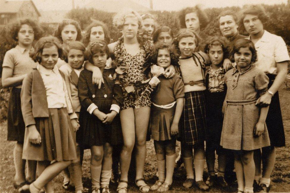 A group of young girls and women