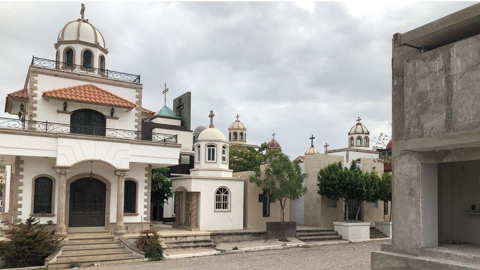 A view of some of the buildings marking graves at the Jardines del Humaya cemetery