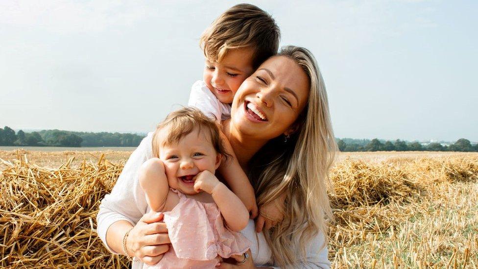 Alex Robins with her son and daughter