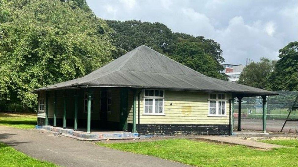 Single storey pavilion, mainly wood with pyramid roof