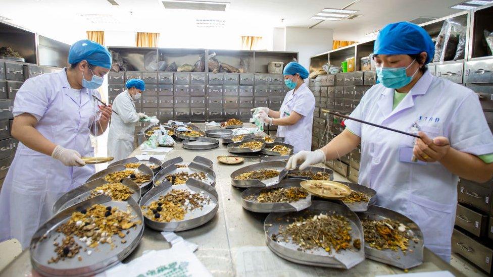 Workers preparing food