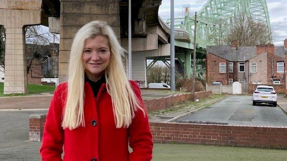 Susan Nickson stood under flyover near to Runcorn Widnes bridge