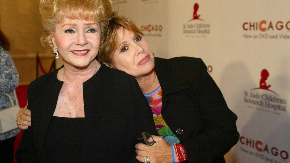 Debbie Reynolds (left) and Carrie Fisher together in Beverly Hills, California, 19 August 2003