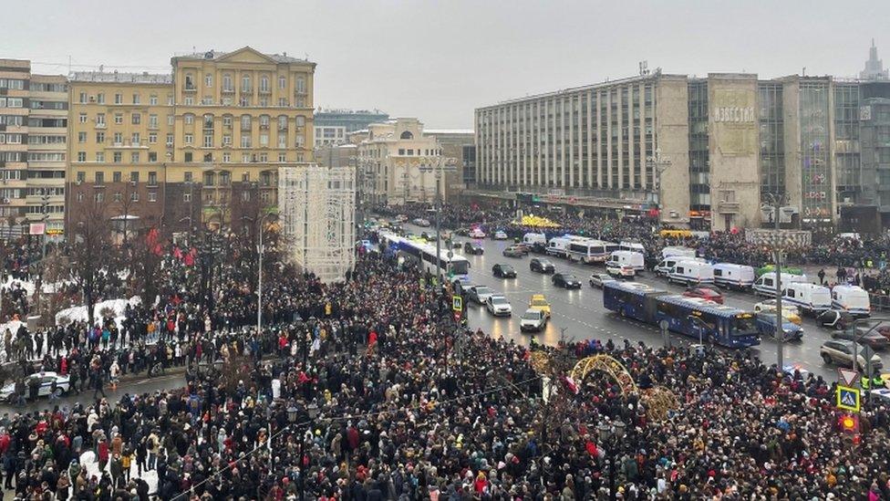 People attend a rally in support of jailed Russian opposition leader Alexei Navalny in Moscow, Russia