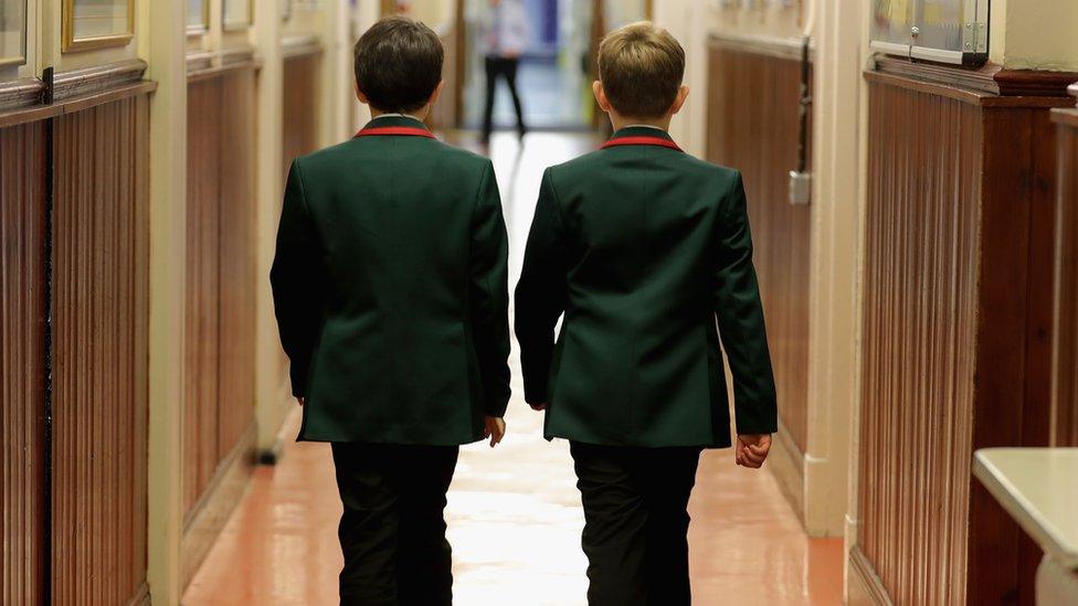 School boys in a corridor