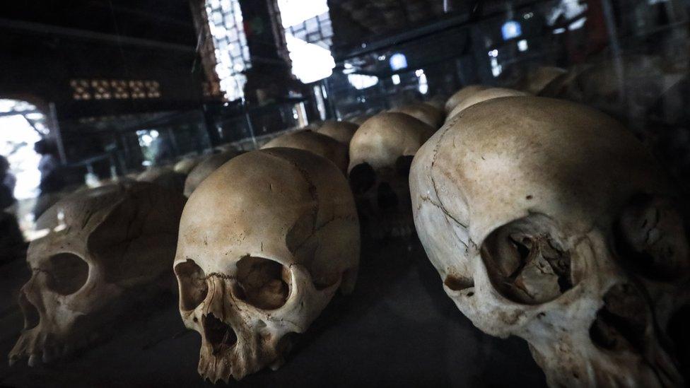 victims' skulls laid out in the Rwandan church they were killed in