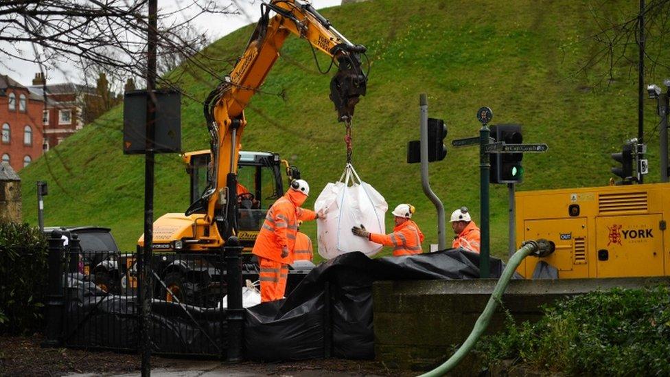 Barricades are put in lace by emergency workers in North Yorkshire