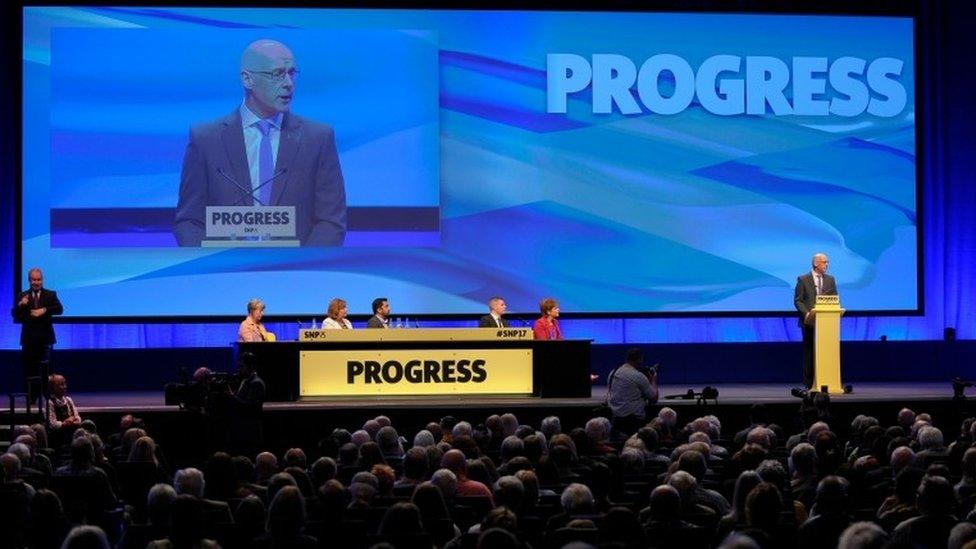 John Swinney speaking at the conference