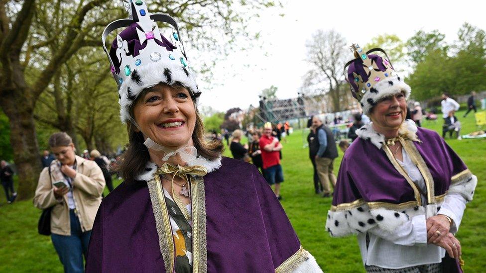 Two women with crowns on the Windsor Long Walk