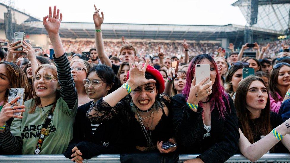 Fans on the front row at Ashton Gate for the Arctic Monkeys concert