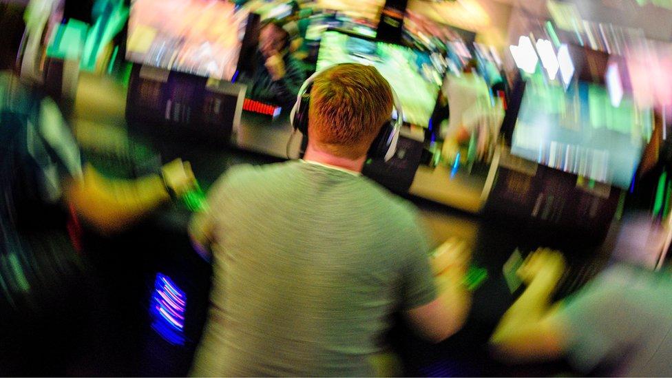 Gamer at 'World Of Warcraft' at the Blizzard Entertainment stand at the Gamescom 2016