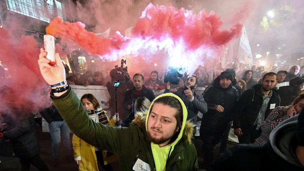 Protesters outside parliament building in Tbilisi, Georgia