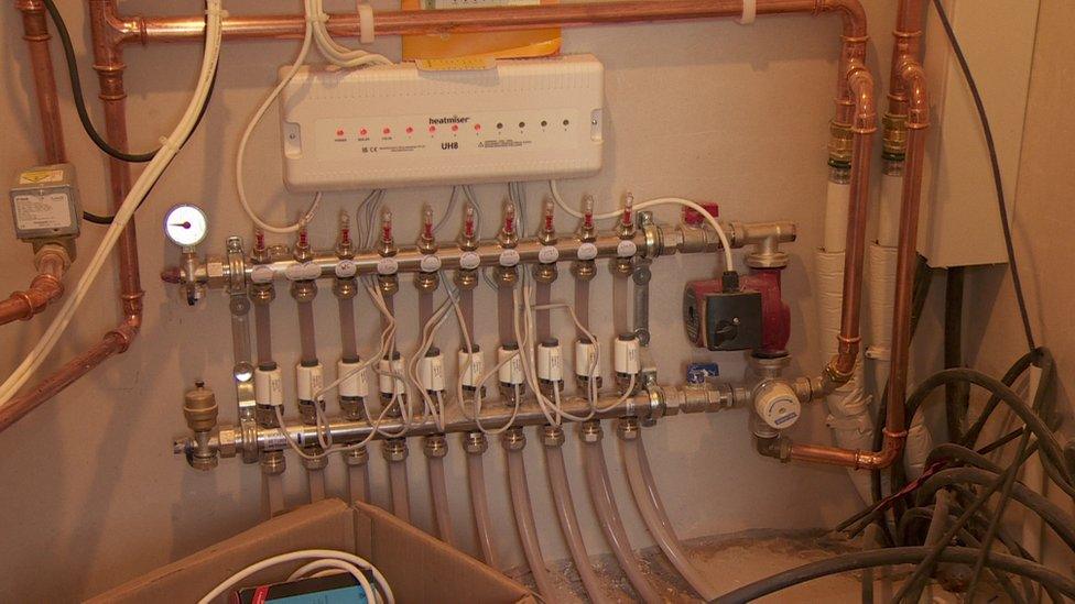 plumbing for the air source heat pump has been adapted for the oil boiler the couple have had to install