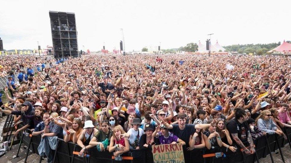 Festival goers watch Easy Life perform on the main stage at Reading Festival