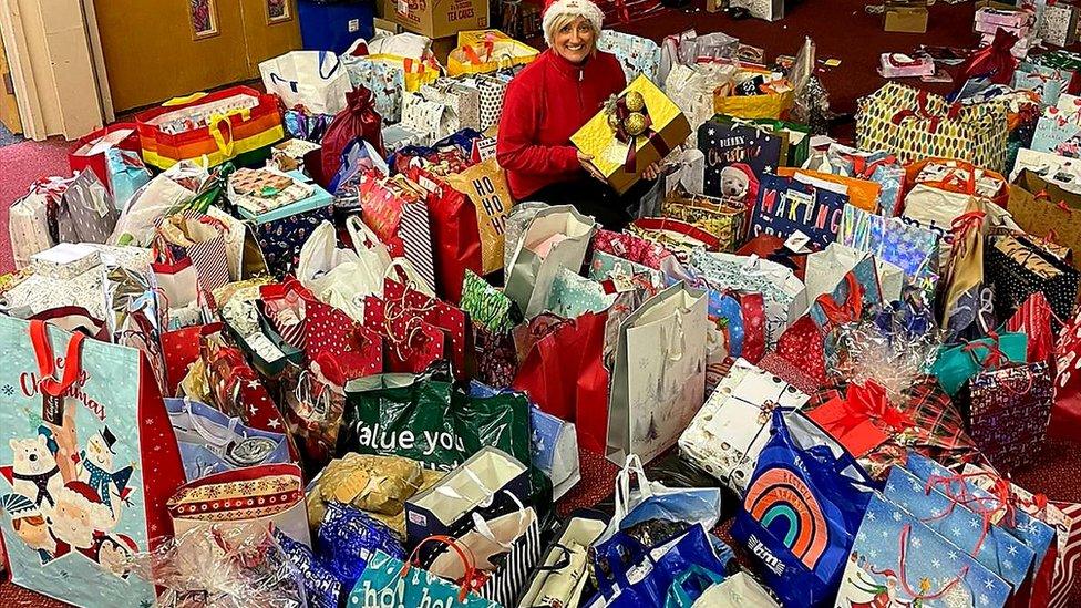 Heather Houston with just some of the gifts provided for the campaign