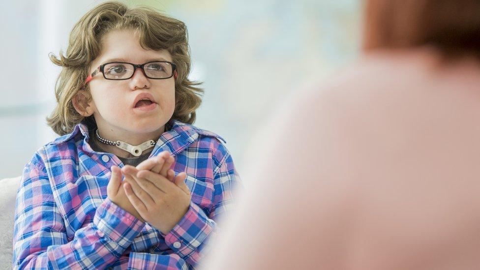 child-using-sign-language.