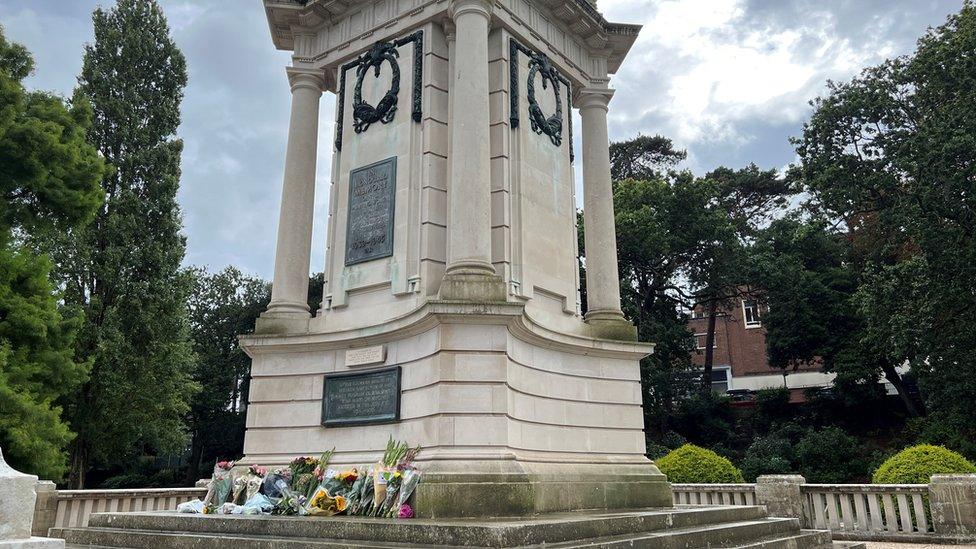 Flowers laid at the base of Bournemouth Cenotaph