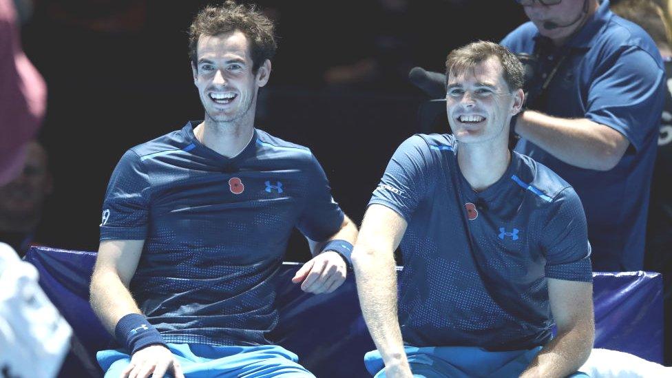 Andy-Murray-and-Jamie-Murray-during-a-doubles-match-on-November-7-2017-in-Glasgow-Scotland