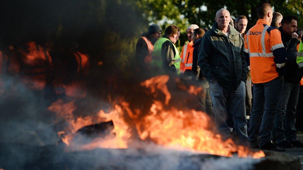 Workers on strike blocking the access to the harbour of Saint-Nazaire in western France