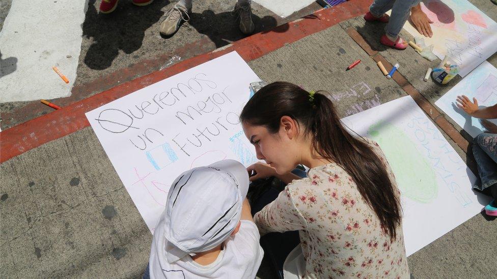 Children write 'We want a better future' in protest in Guatemala City - September 2015