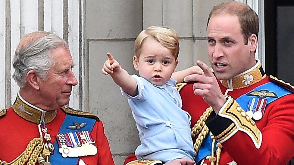 Prince Charles, his grandson Prince George and son Prince William, the Duke of Cambridge on the balcony of Buckingham Palace