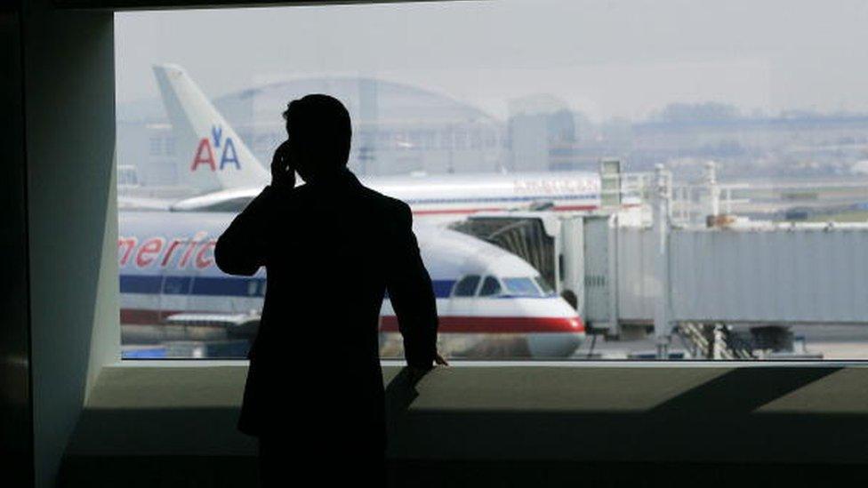 a passenger in an airport terminal