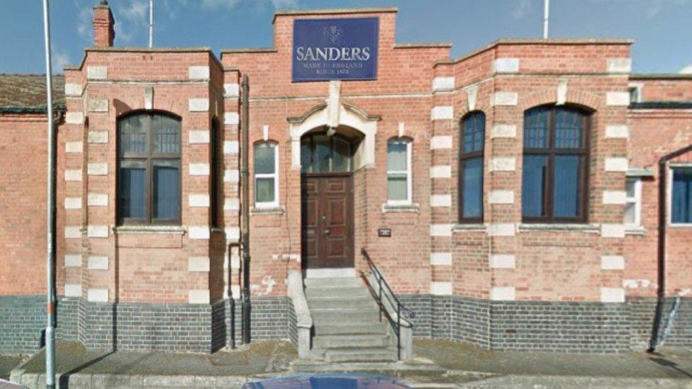 Brick-built two-storey factory with Sanders sign above the door