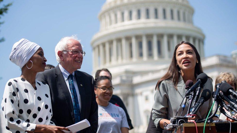 Representative Alexandria Ocasio-Cortez speaks alongside US Senator Bernie Sanders and Representative Ilhan Omar outside US capitol