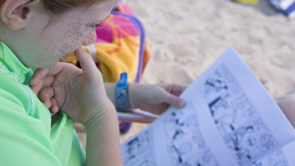 Girl reading a comic