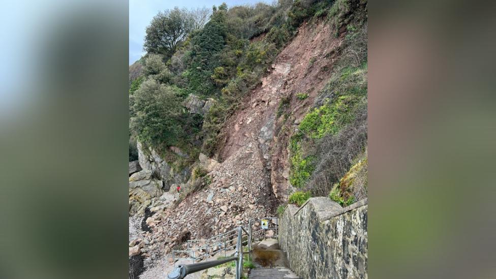 Cliff collapse with blurred lines around the edge of a portrait image