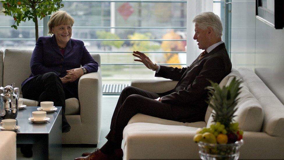 Angela Merkel and Bill Clinton in her office