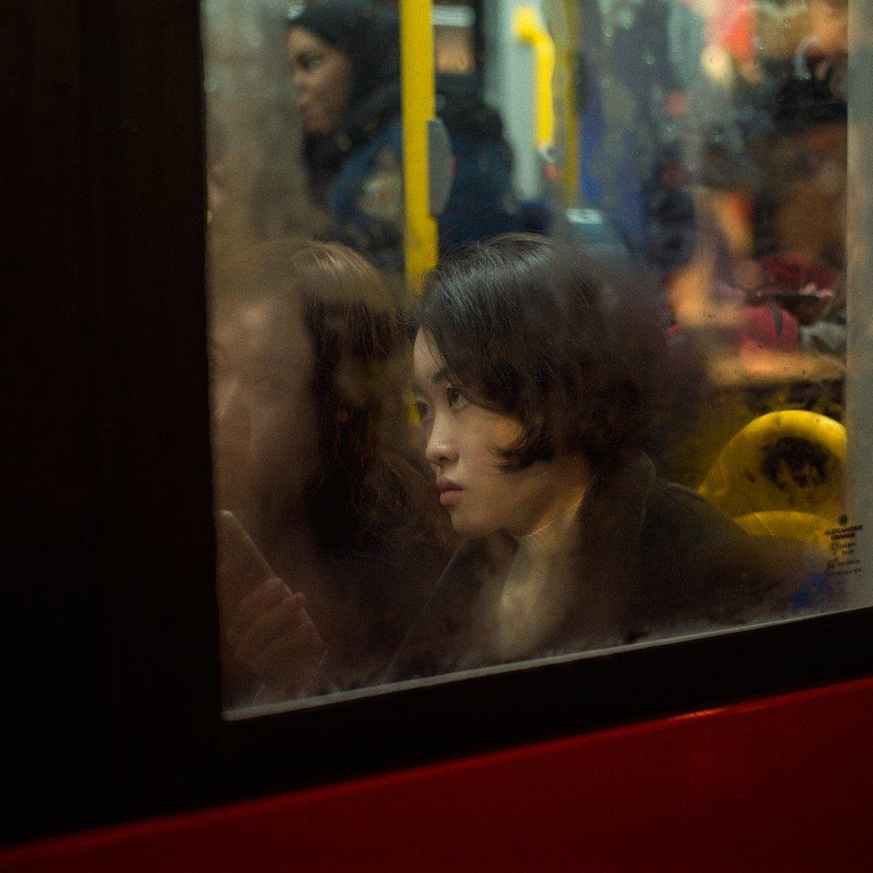 Woman on a bus