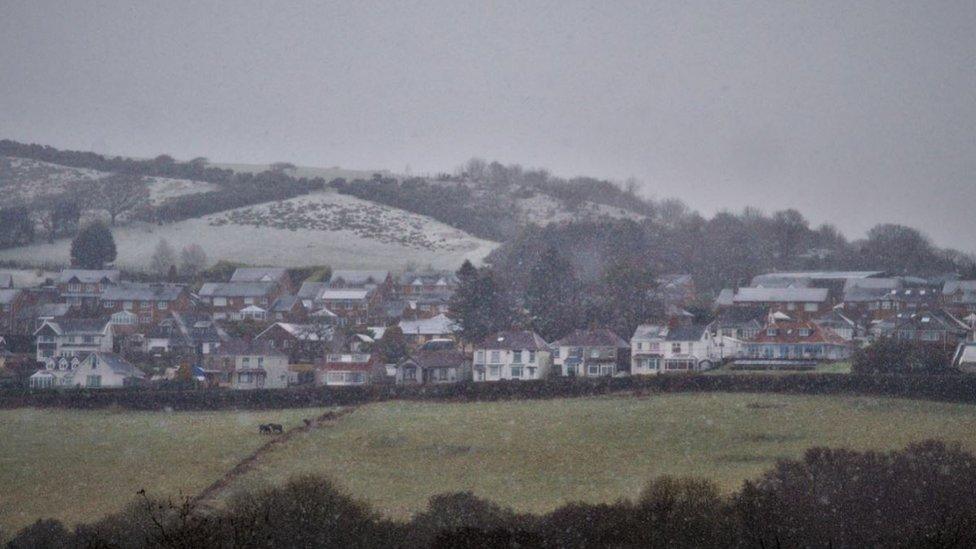 Snow begins to fall at Fforest in Carmarthenshire on Sunday