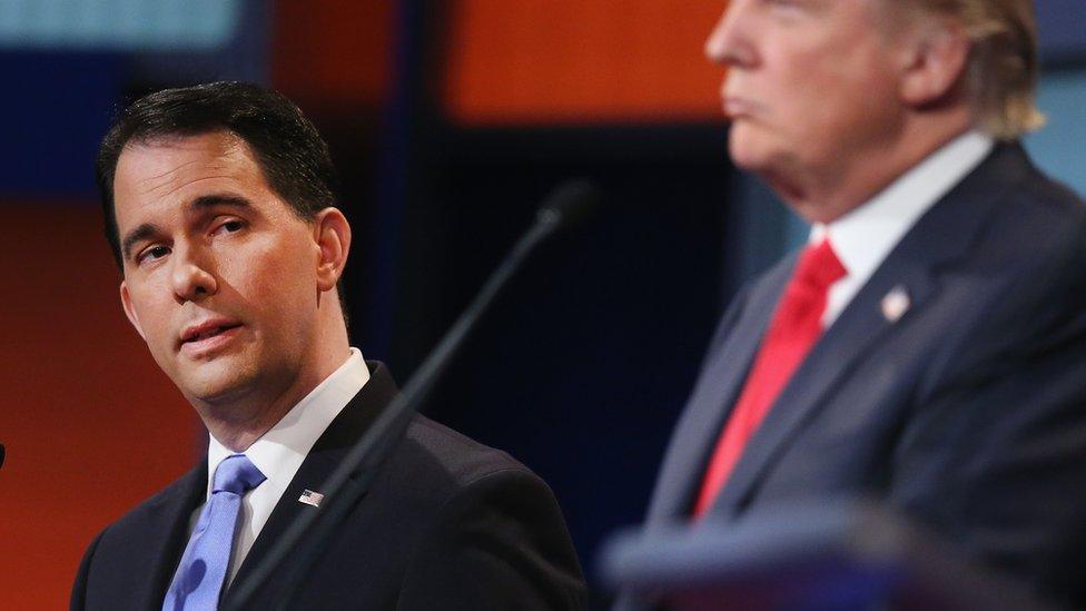 Scott Walker looks at Donald Trump during the first Republican debate.