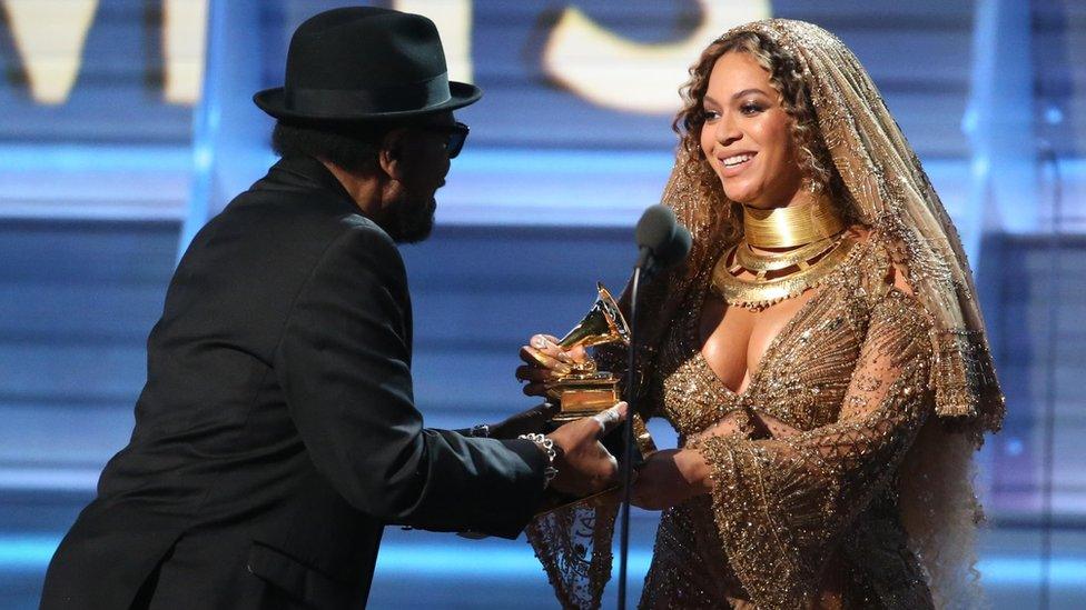 Beyonce accepts her Grammy